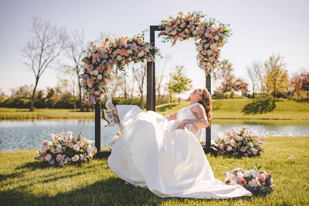 Bride, wedding arch, spring flowers, wedding ceremony Inso