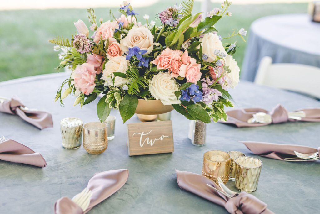 Short Centerpiece, gold votives, wooden table number, spring flowers, pink wedding flowers, compote centerpiece