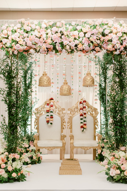 Indian wedding ceremony mundap with pink and greenery