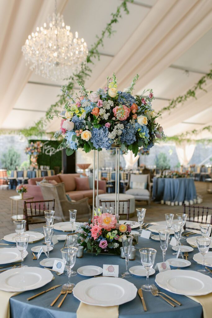 Tall wedding flower centerpieces on gold stands at the Green Acres Foundation in Cincinnati Ohio